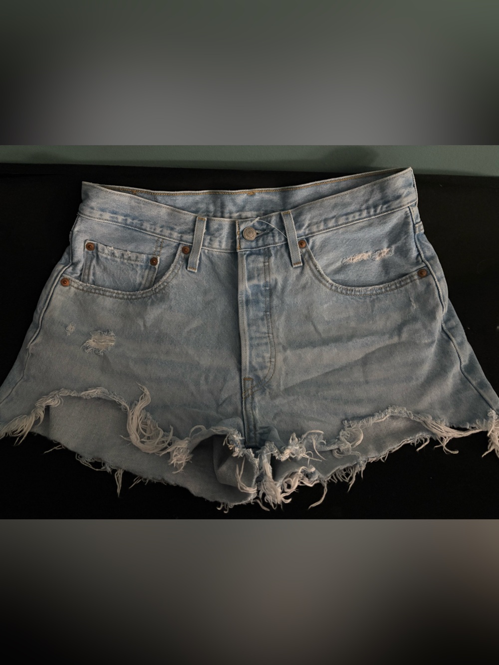 Levi's Light Wash Frayed Denim Cutoff Shorts